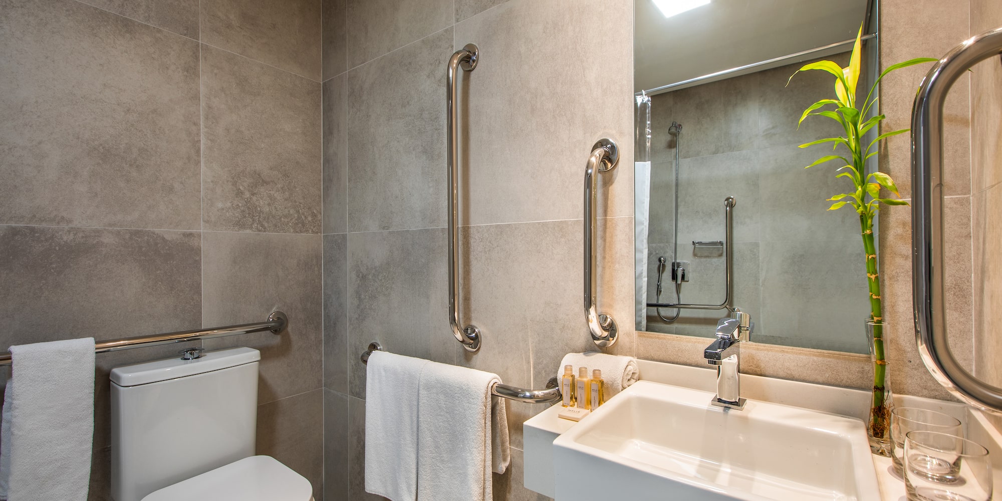 a bathroom with a sink and mirror