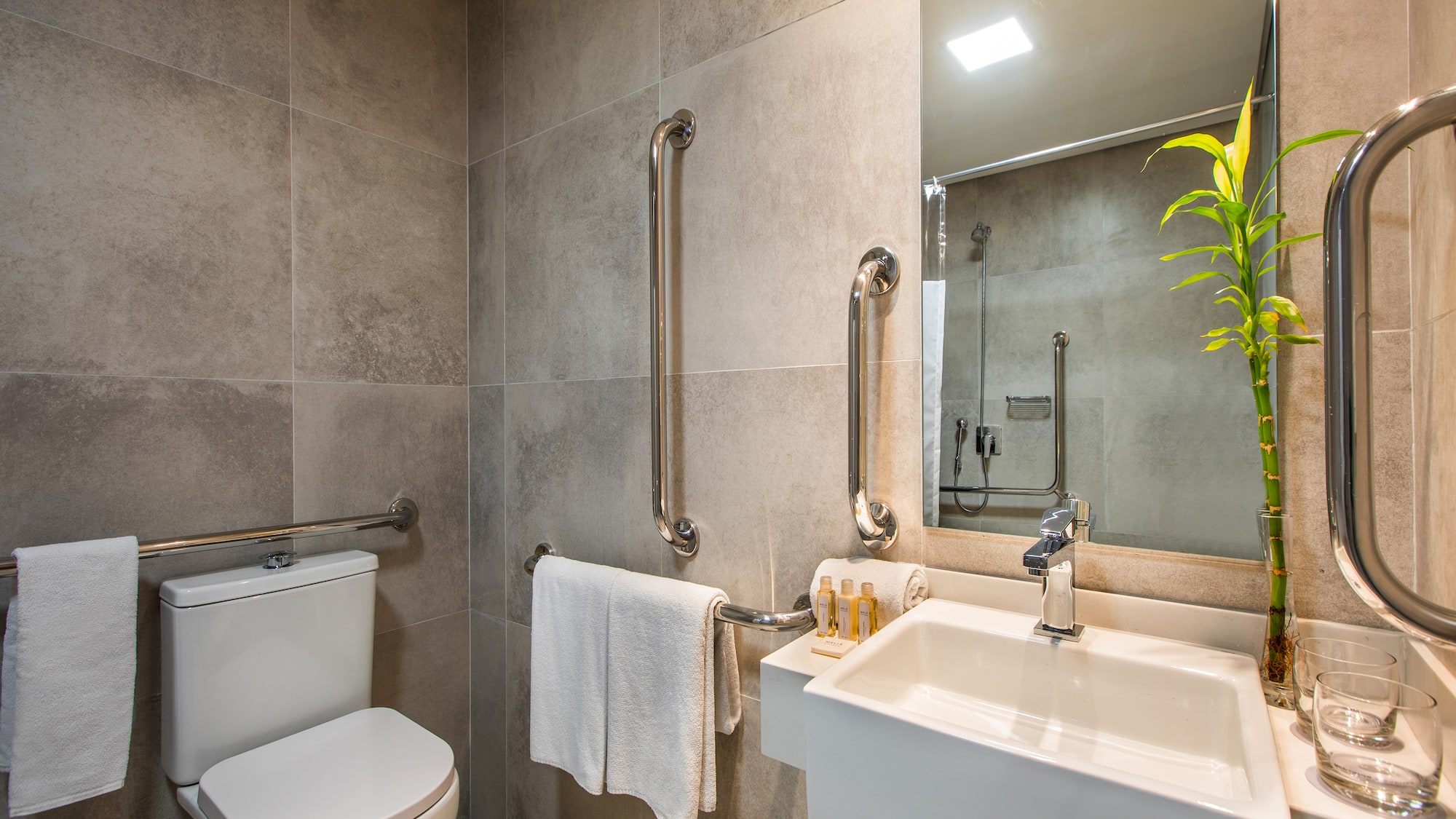 a bathroom with a sink and mirror