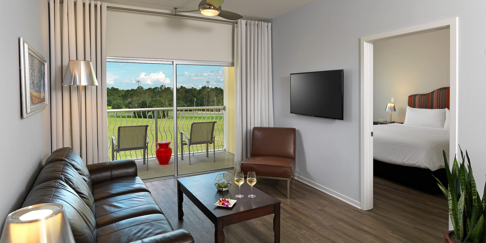 a living room with a television and a couch