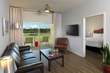a living room with a television and a couch