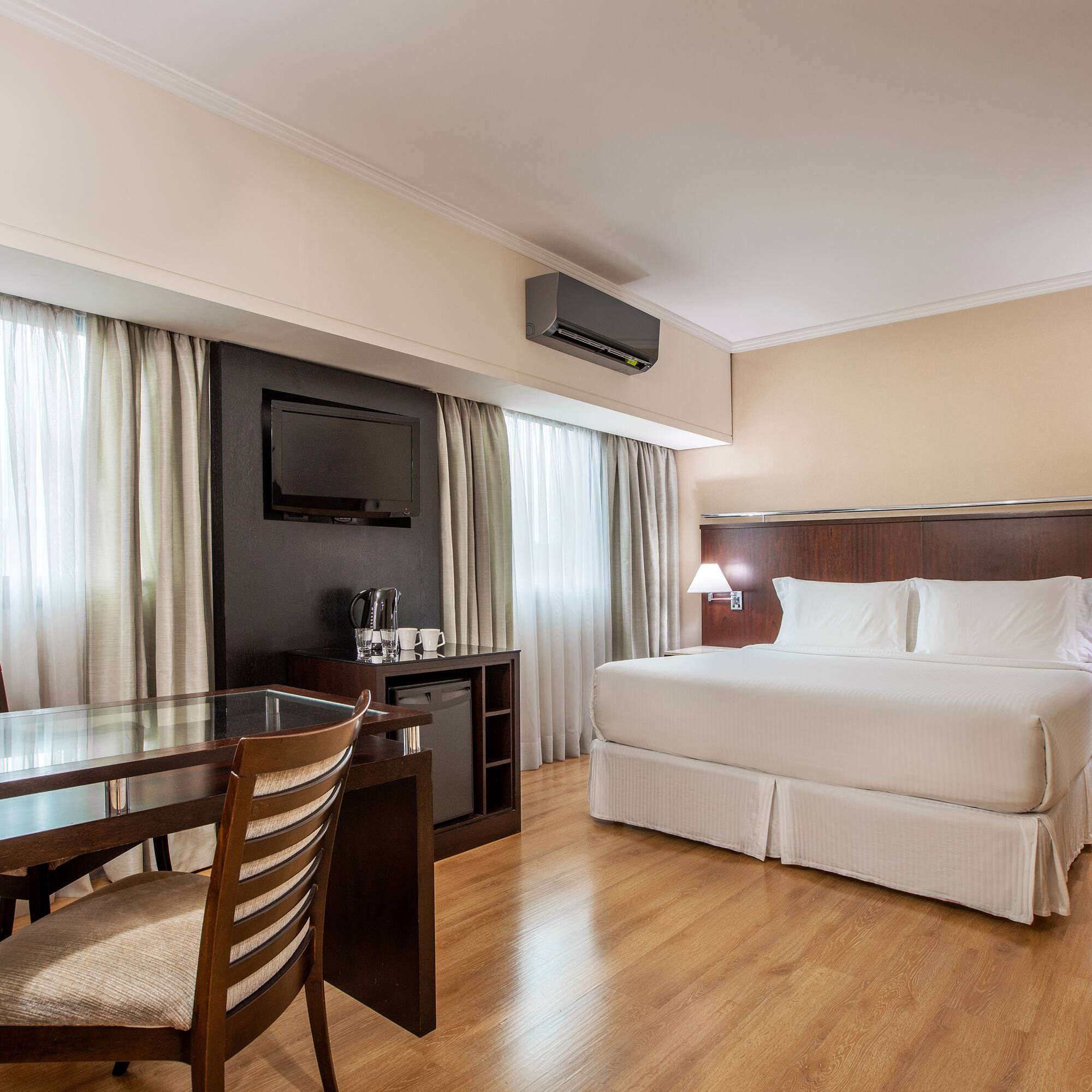 a room with a bed and a table