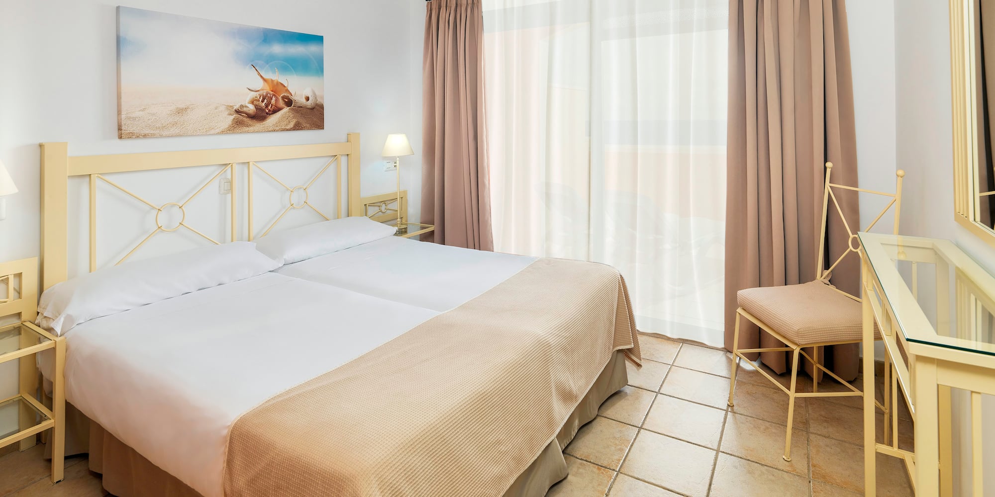 a bedroom with a bed and a fan