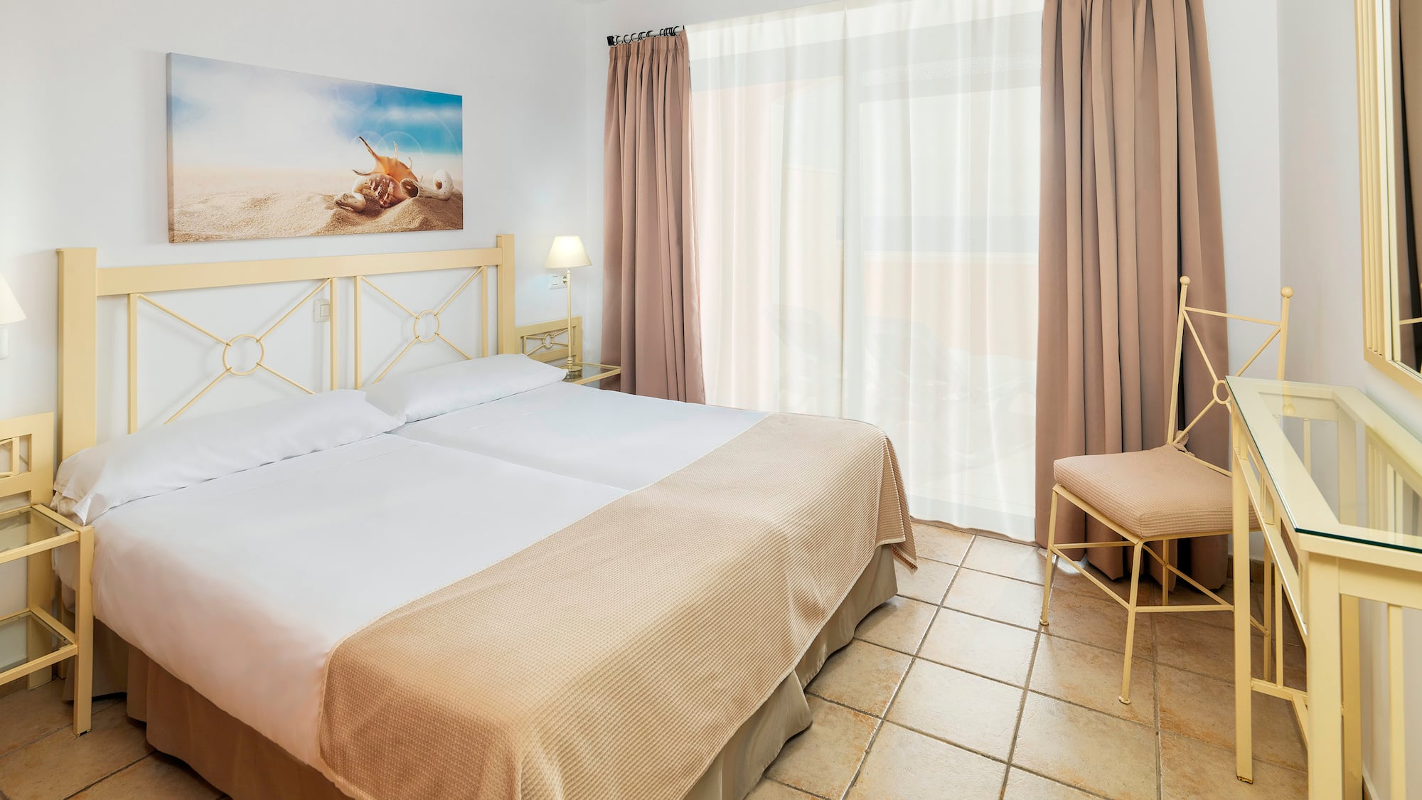 a bedroom with a bed and a fan