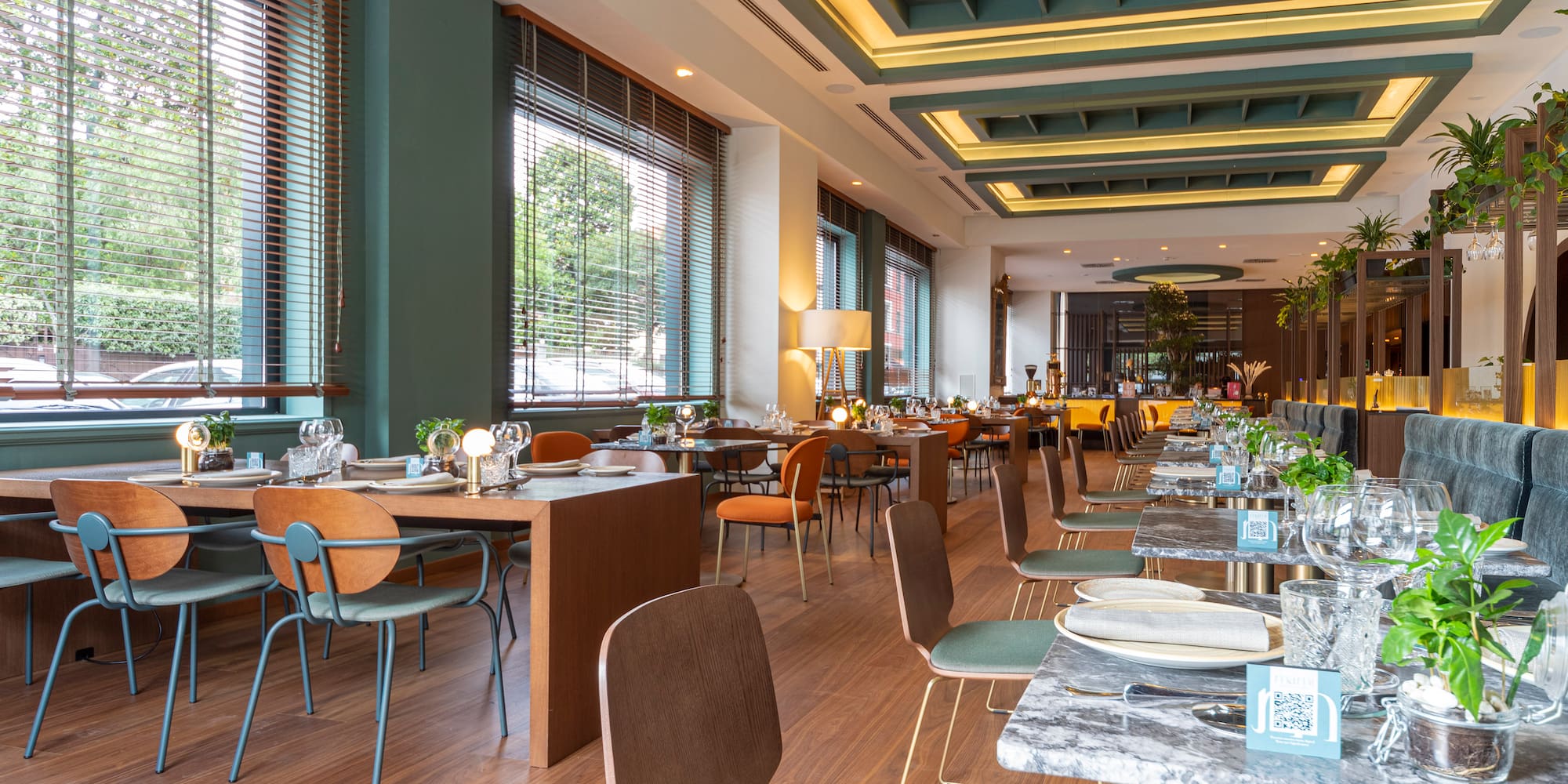 a room with tables and chairs