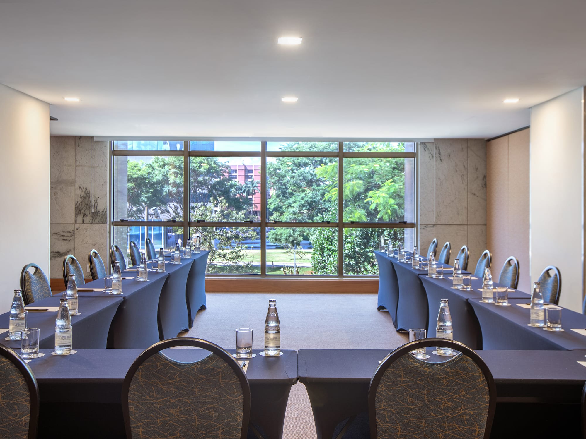 a room with tables and chairs