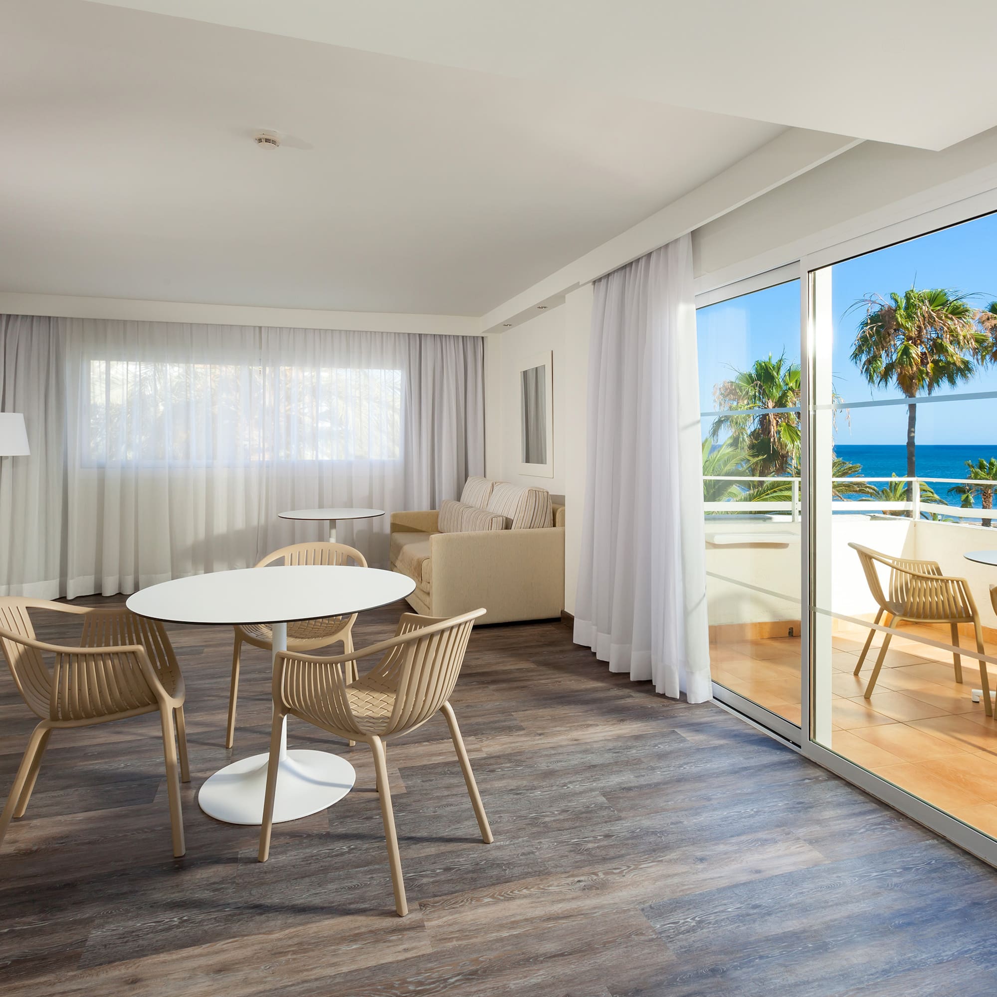 a room with a table and chairs