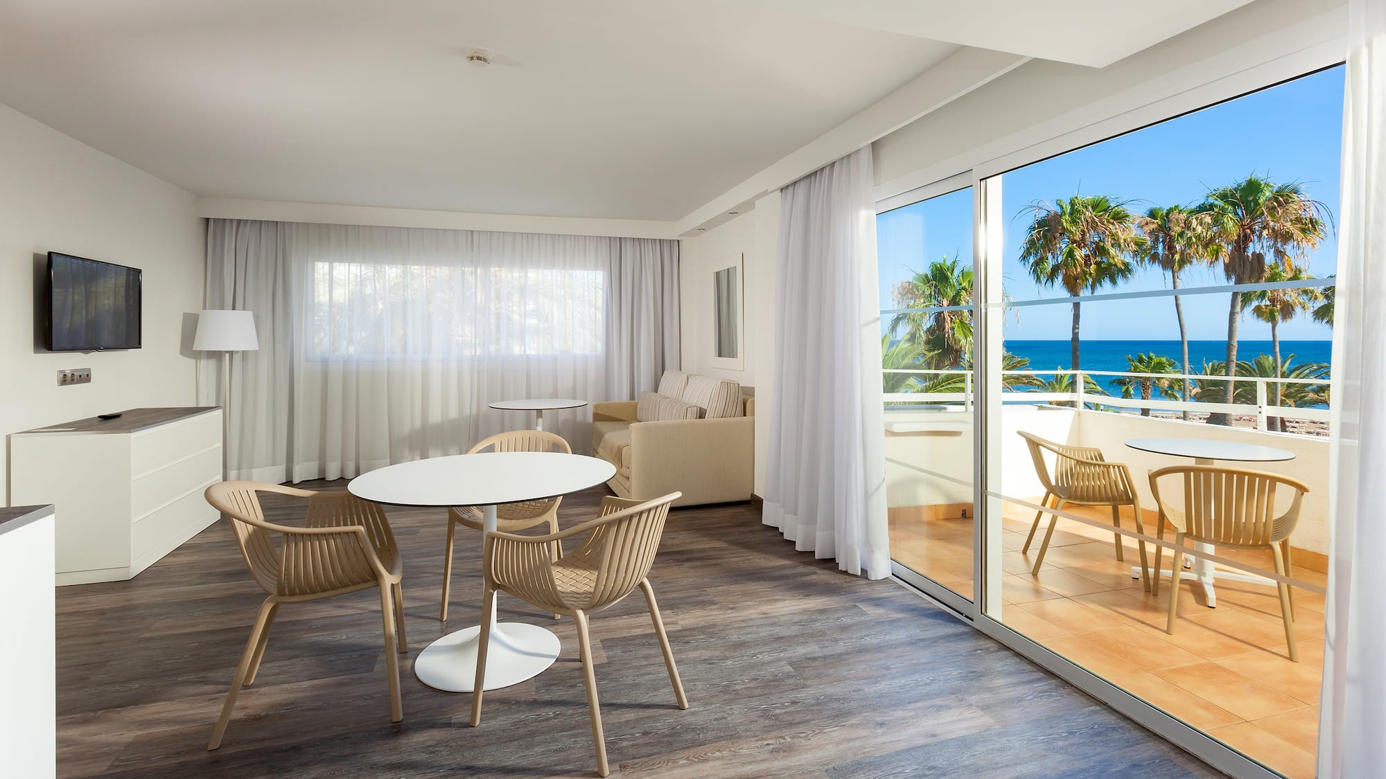 a room with a table and chairs