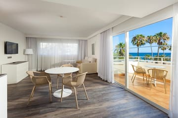 a room with a table and chairs