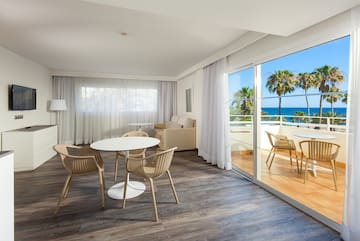 a room with a table and chairs