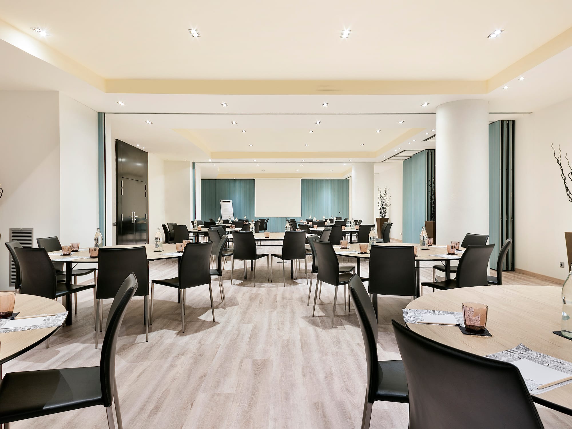 a room with tables and chairs