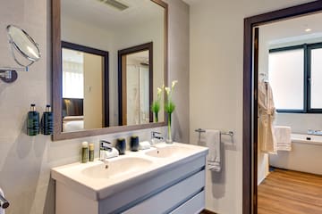 a bathroom with a mirror and sink