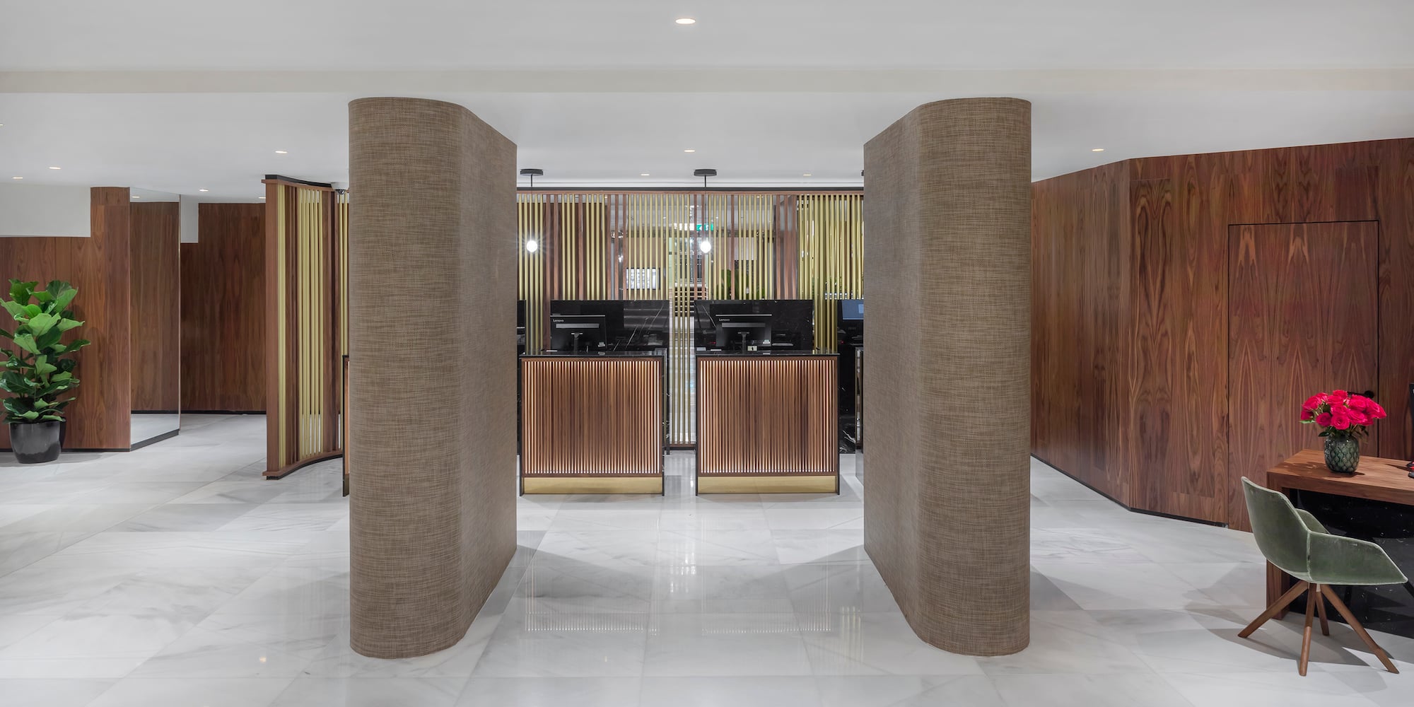 a lobby with columns and a counter