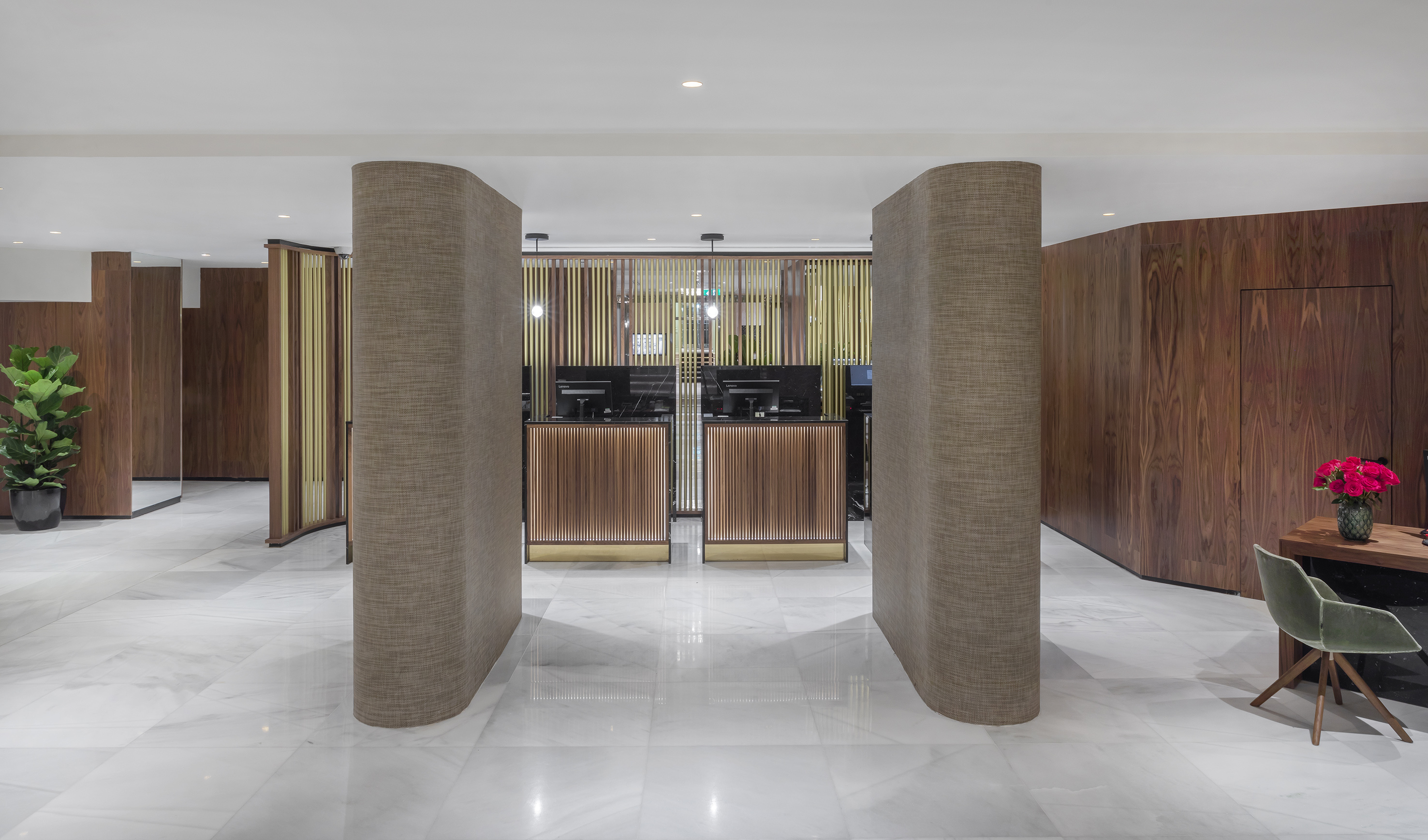 a lobby with columns and a counter