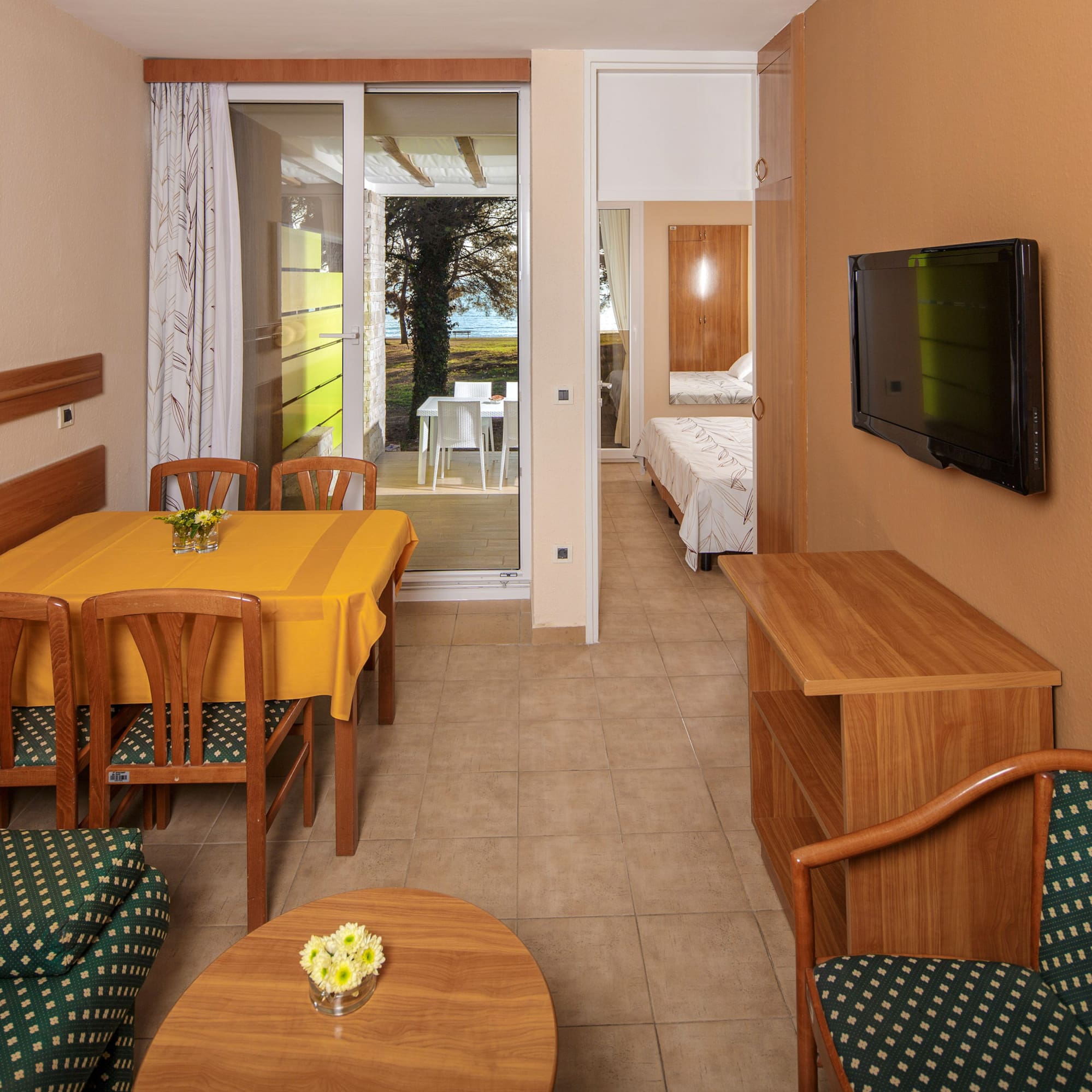 a room with a television and a table