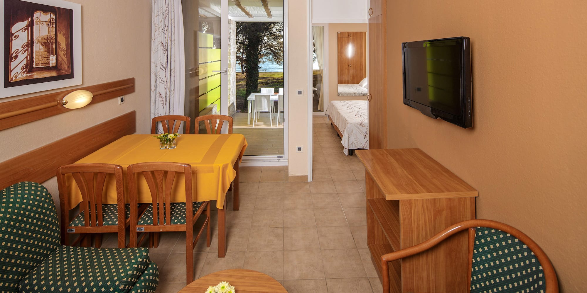 a room with a television and a table