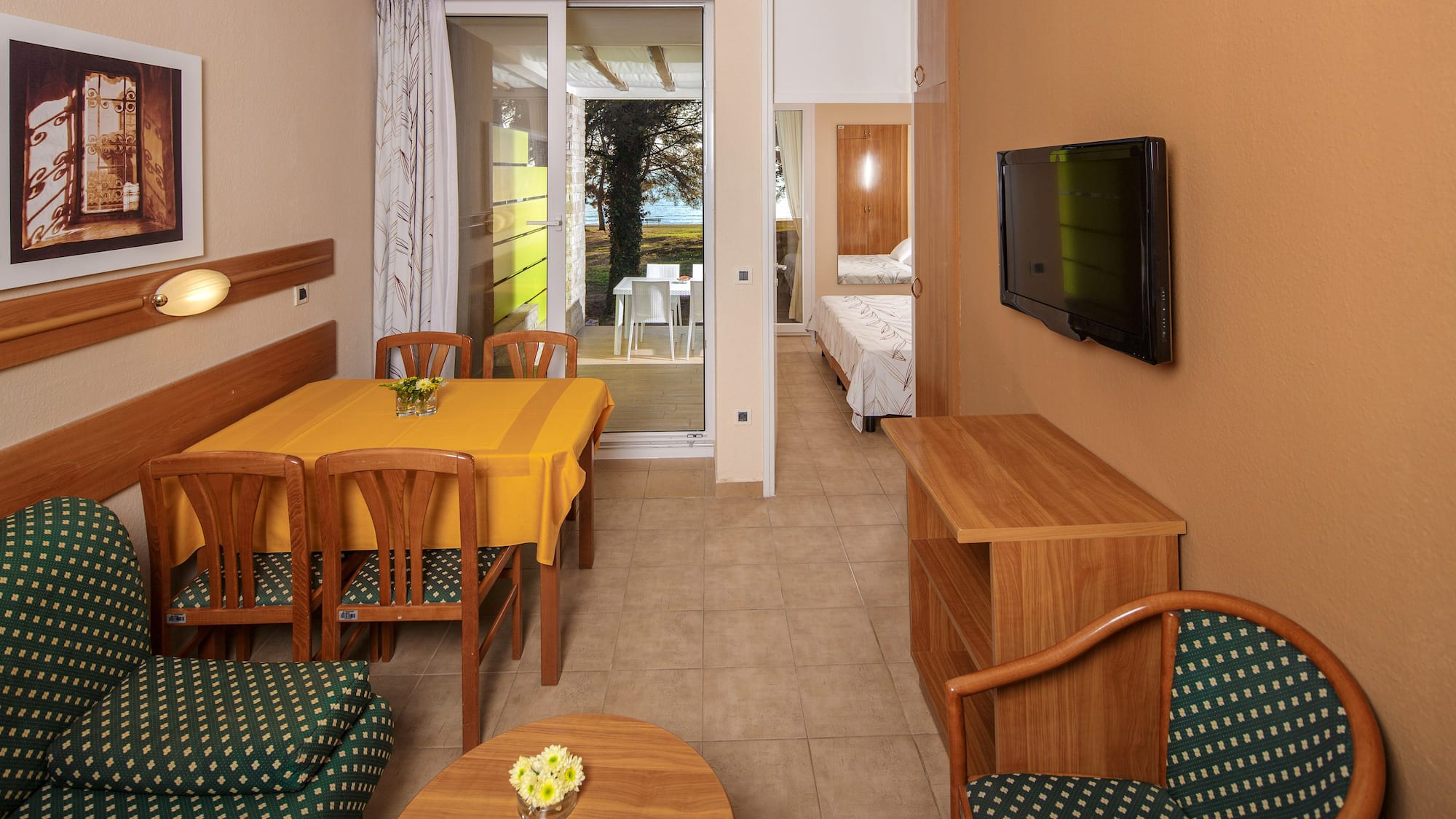 a room with a television and a table