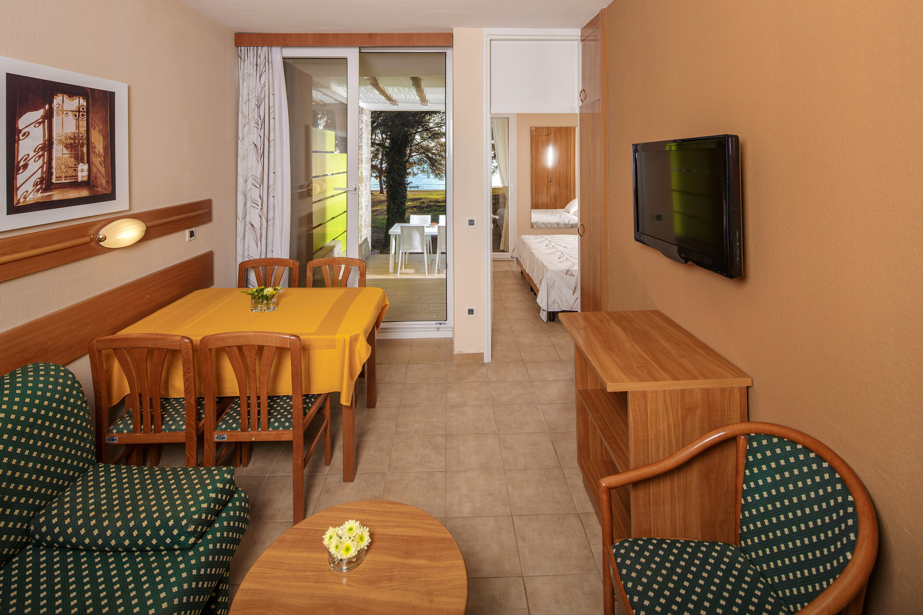 a room with a television and a table