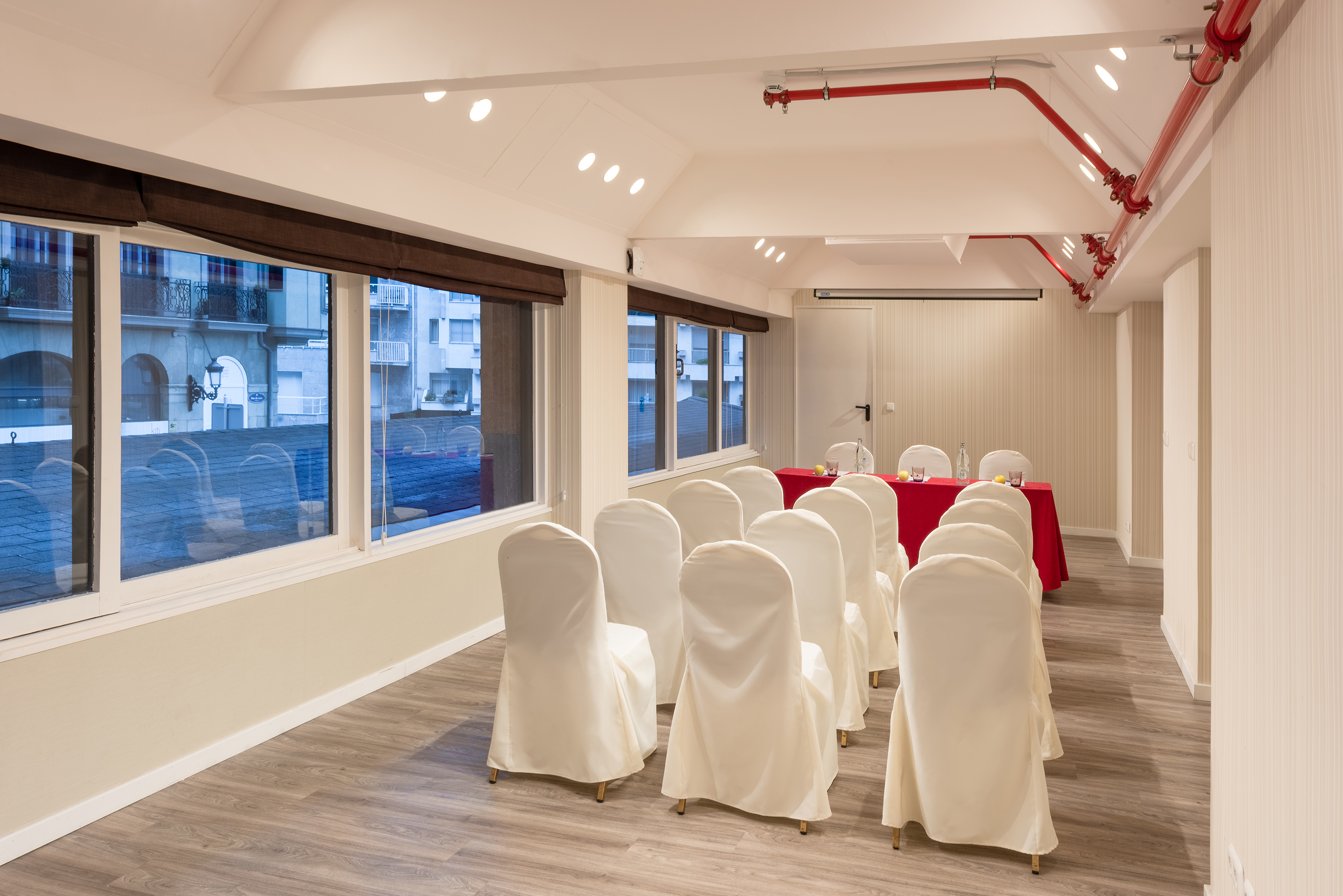 a room with chairs and tables