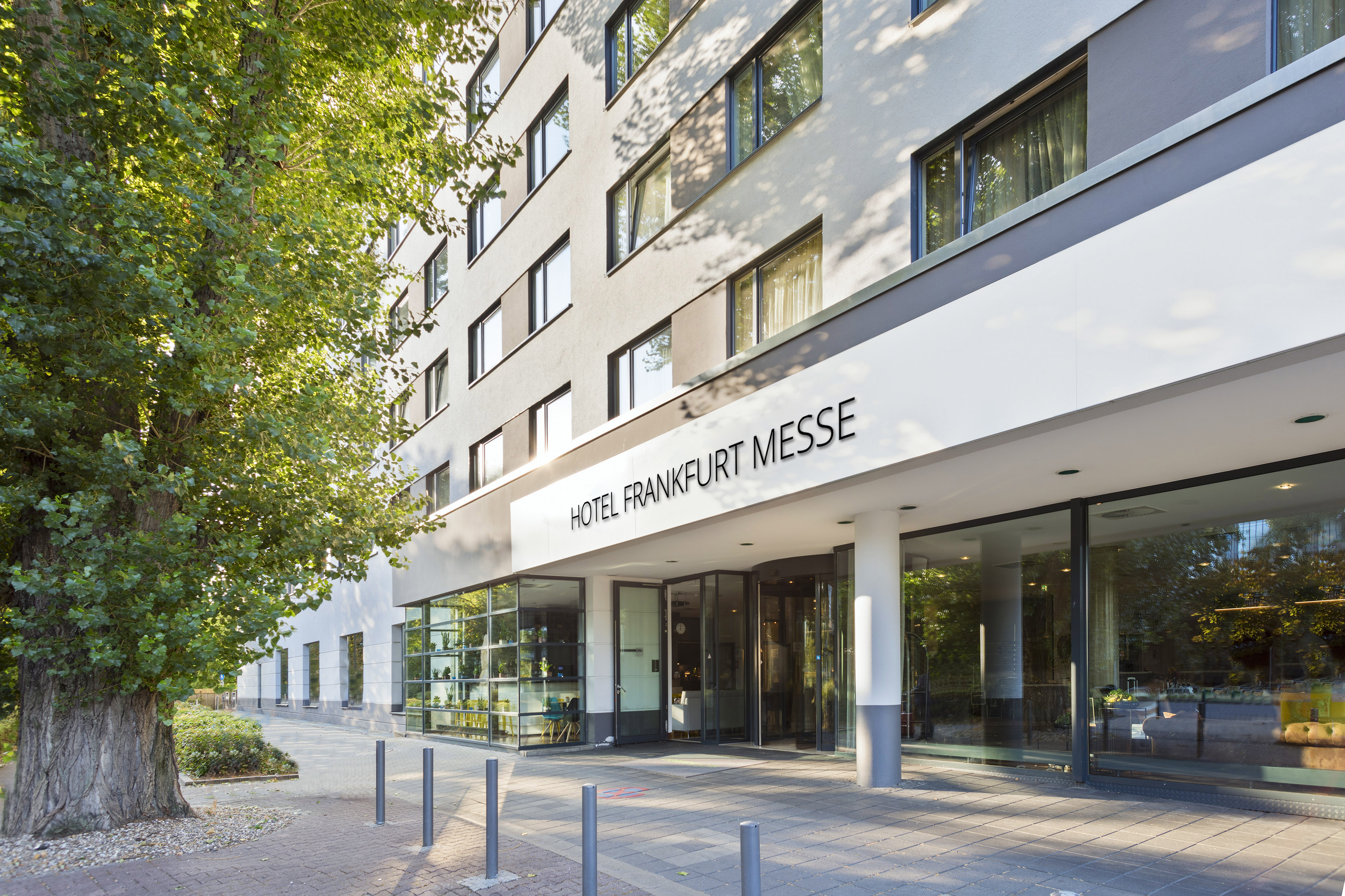 Modern Hotel Frankfurt Messe building exterior with entrance.