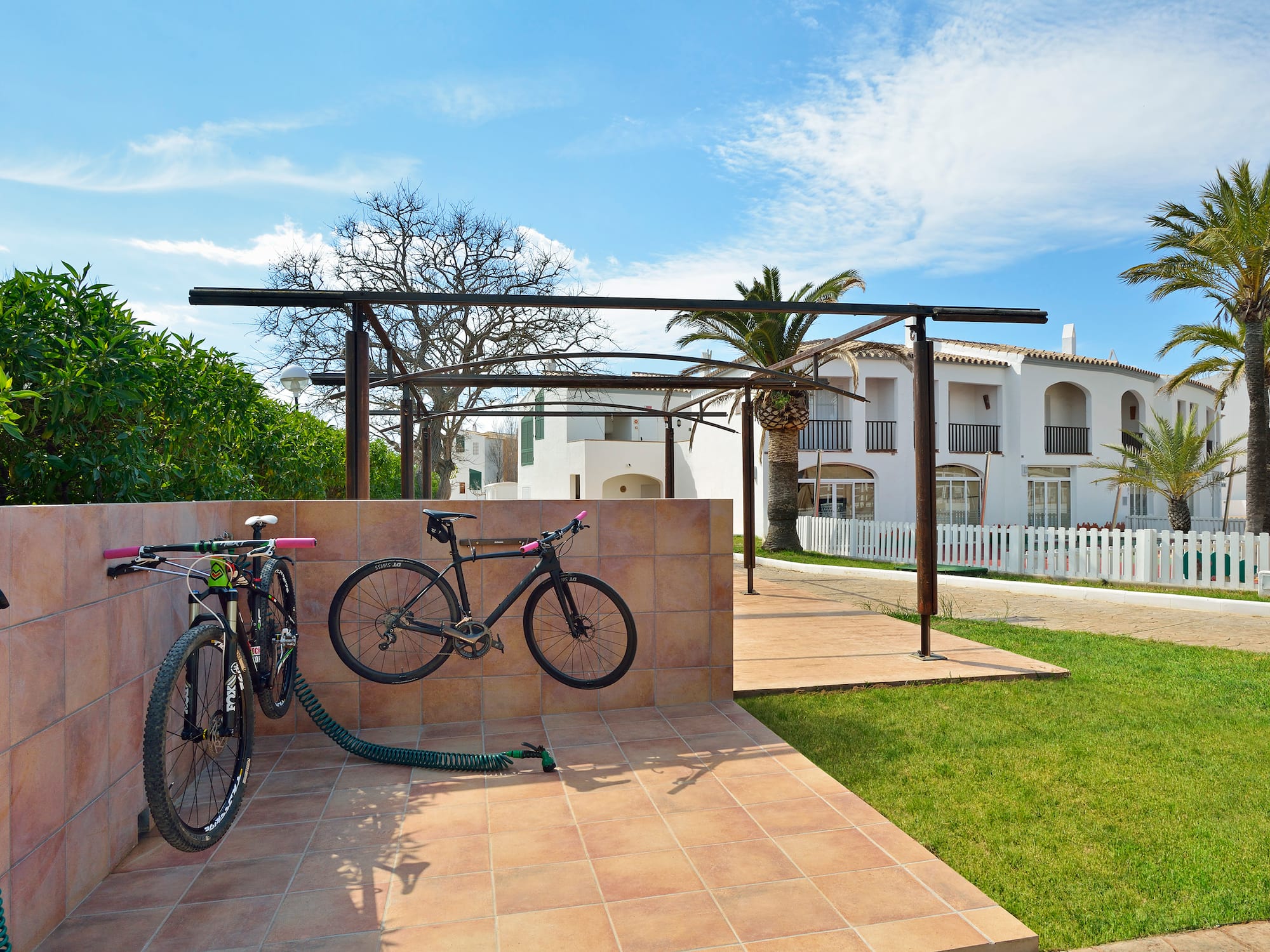two bicycles parked on a patio