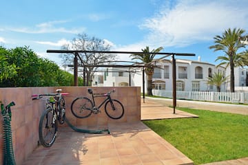 two bicycles parked on a patio