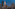 a city skyline with many tall buildings