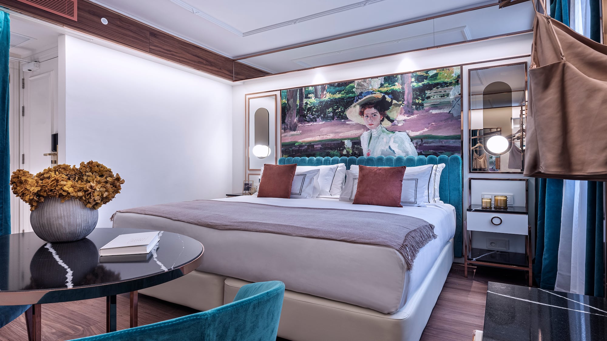 a bedroom with a bed and a table