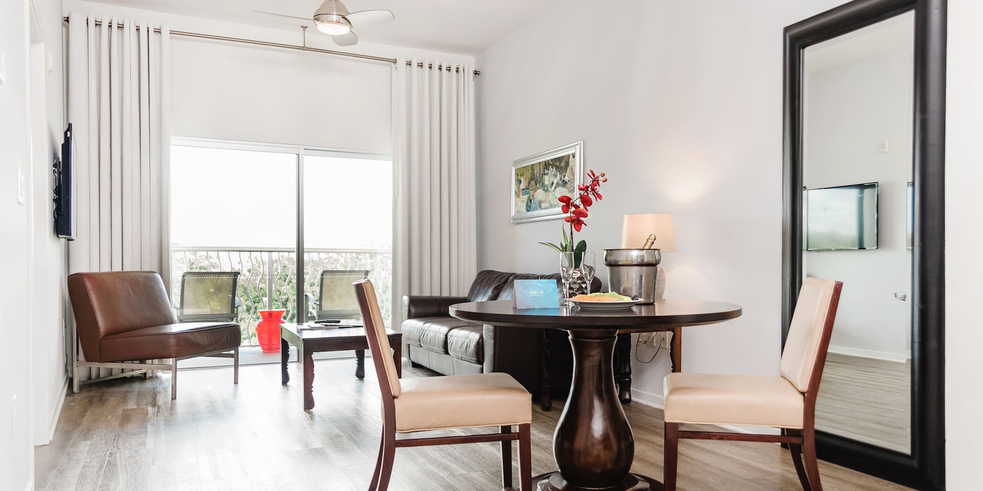 a room with a table and chairs