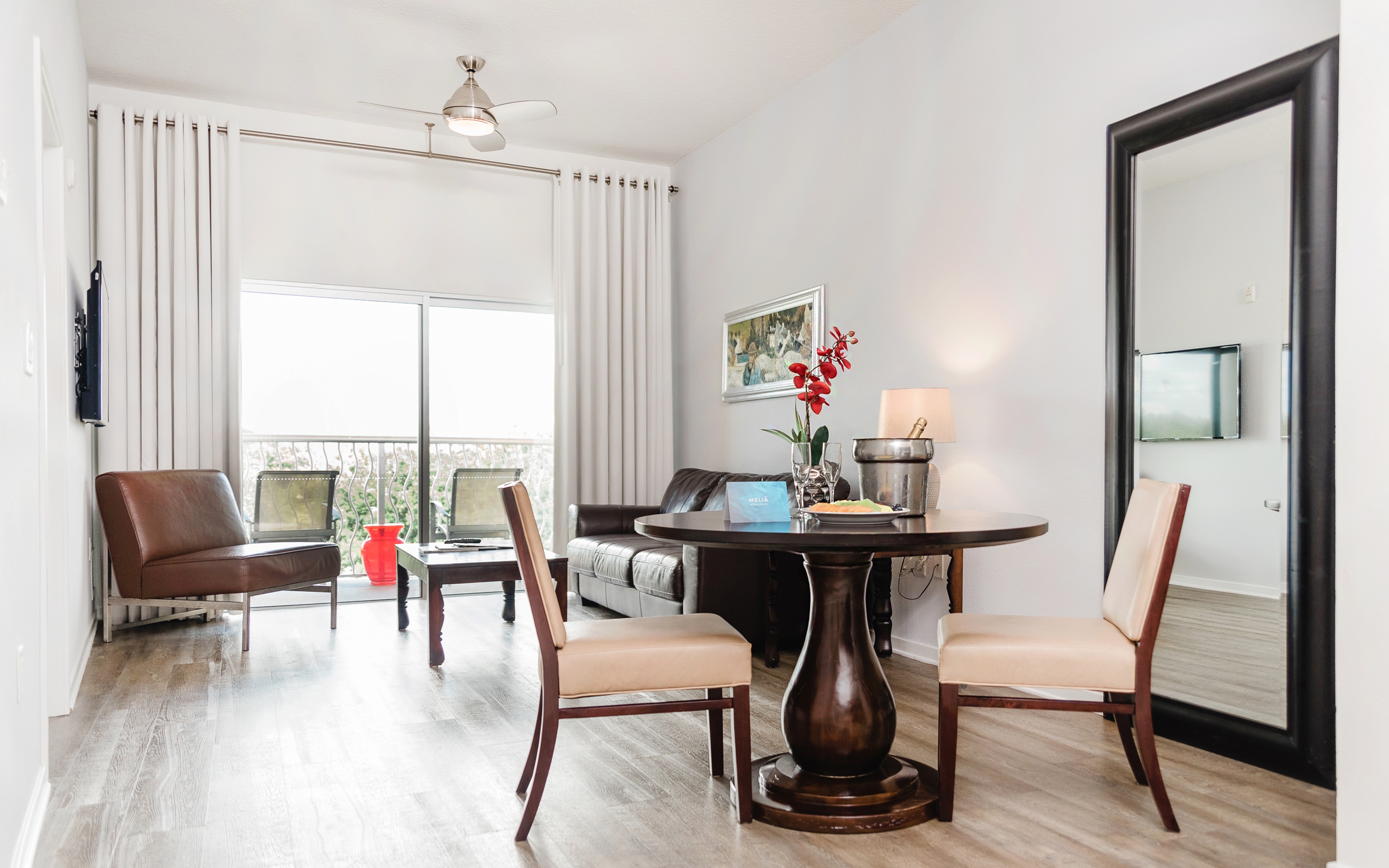 a room with a table and chairs