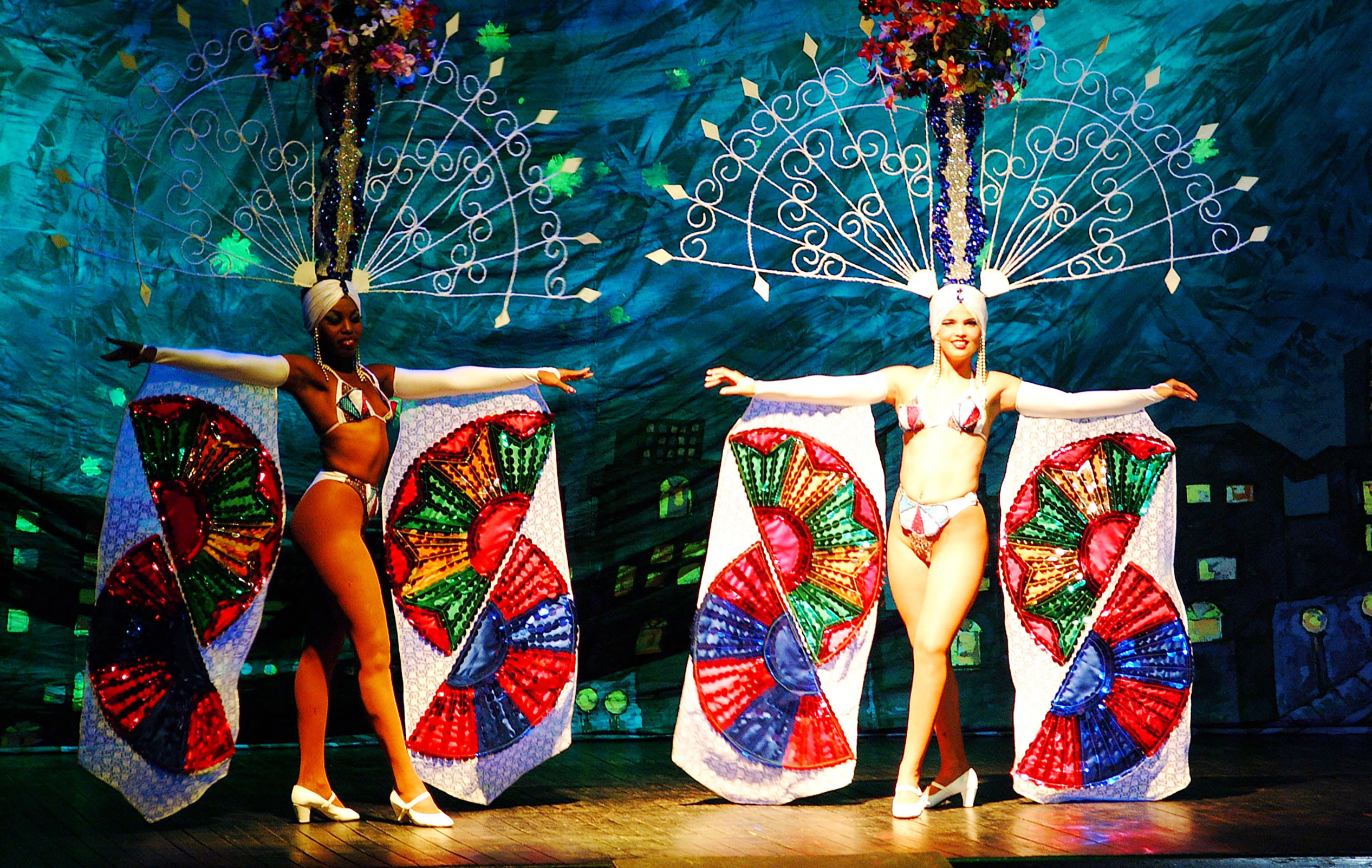 a group of women wearing clothing