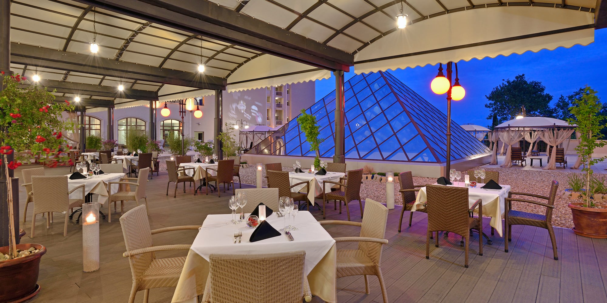 a restaurant with tables and chairs