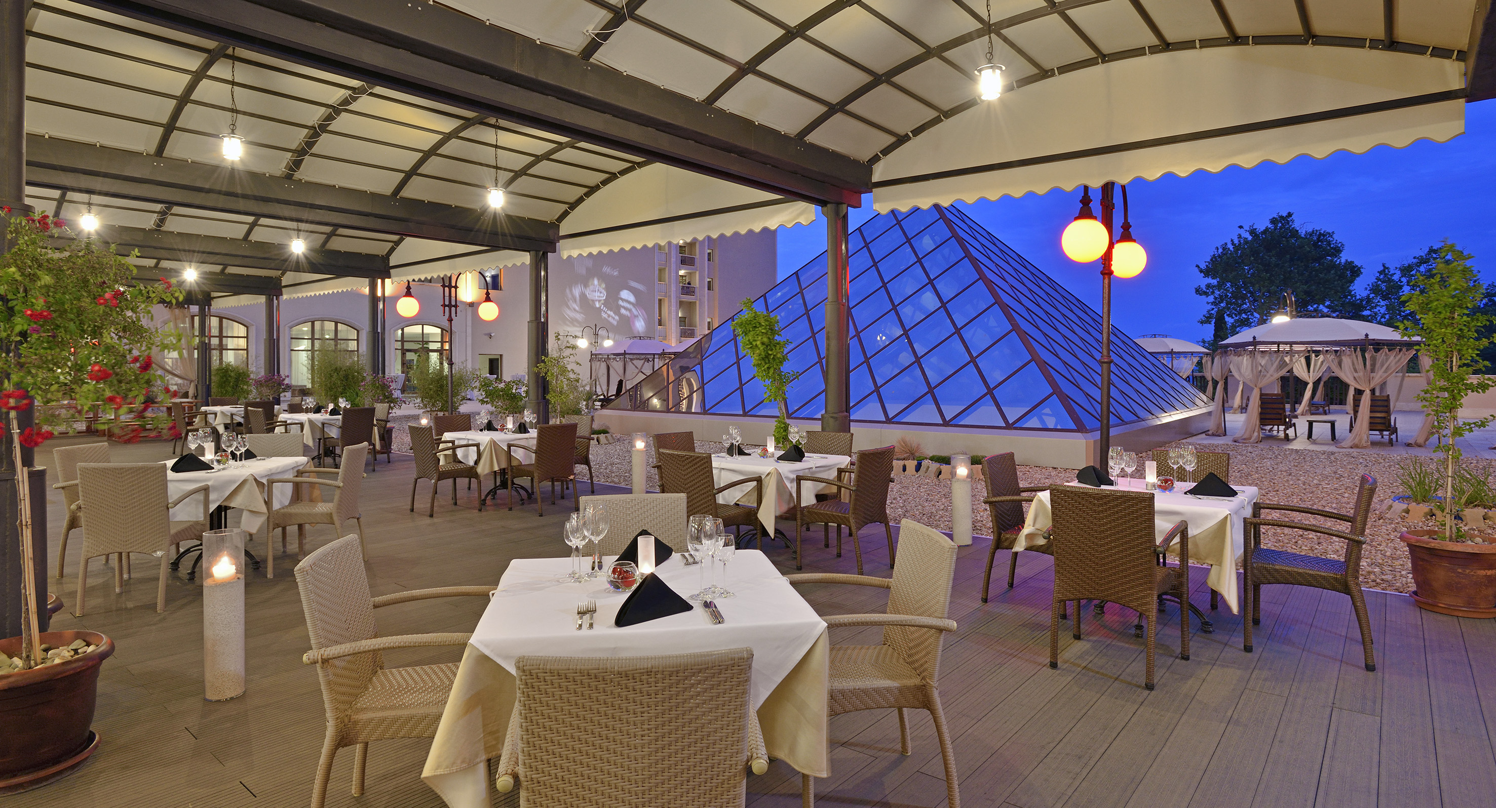 a restaurant with tables and chairs