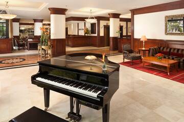 a piano in a hotel lobby