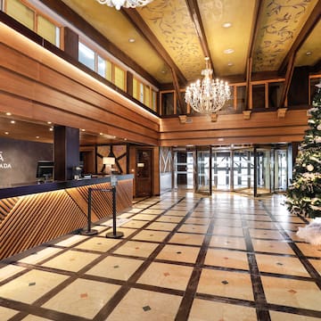 a lobby with a christmas tree