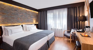 a room with a bed and a chair