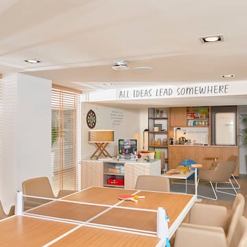 a room with tables and chairs