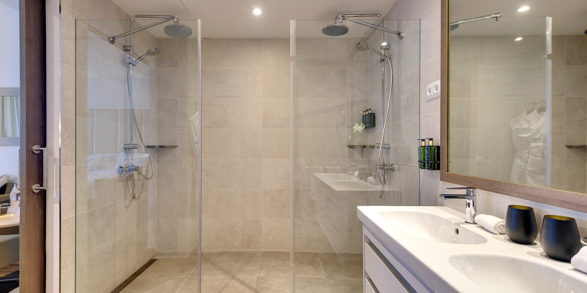 a bathroom with a shower and sink