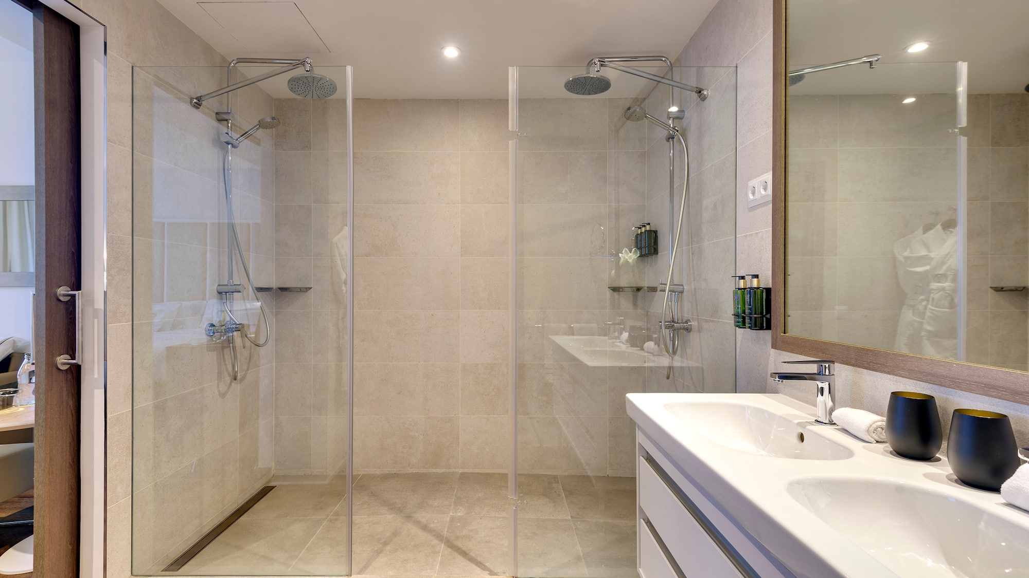 a bathroom with a shower and sink