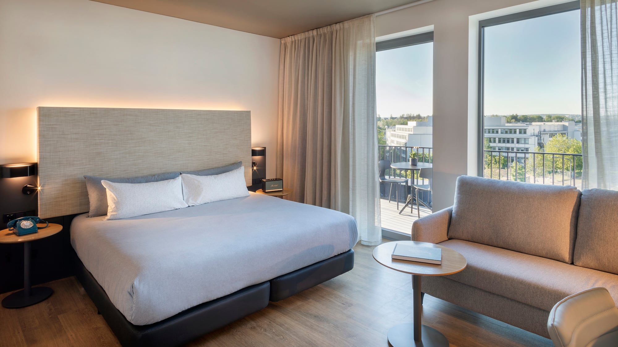 a bedroom with a bed and a chair