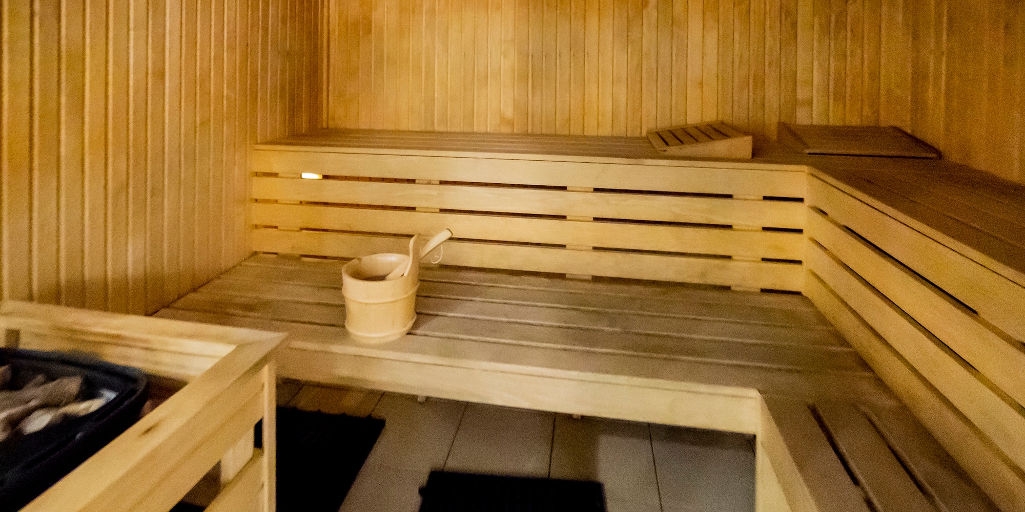 a wooden bench in a sauna