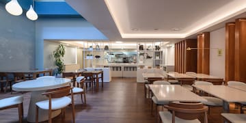 a room with tables and chairs