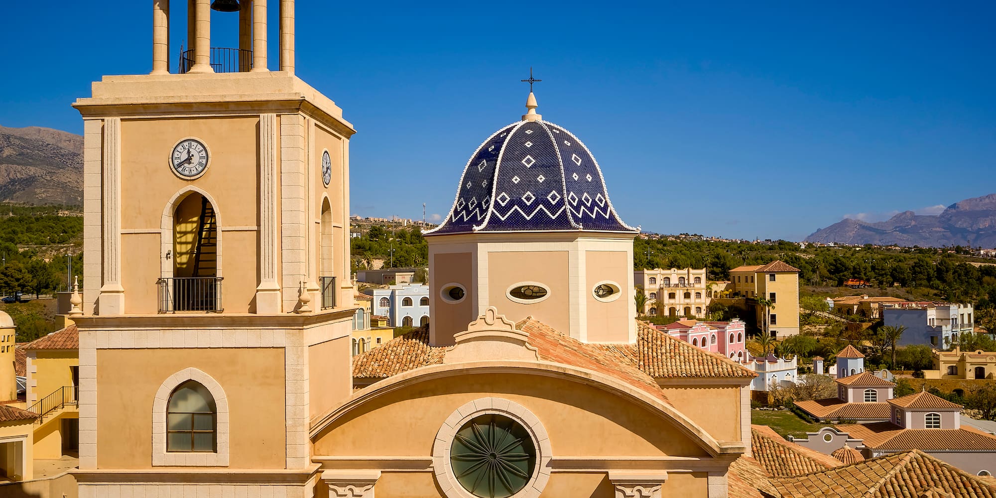 a building with a dome and a bell tower