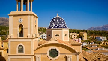 a building with a dome and a bell tower