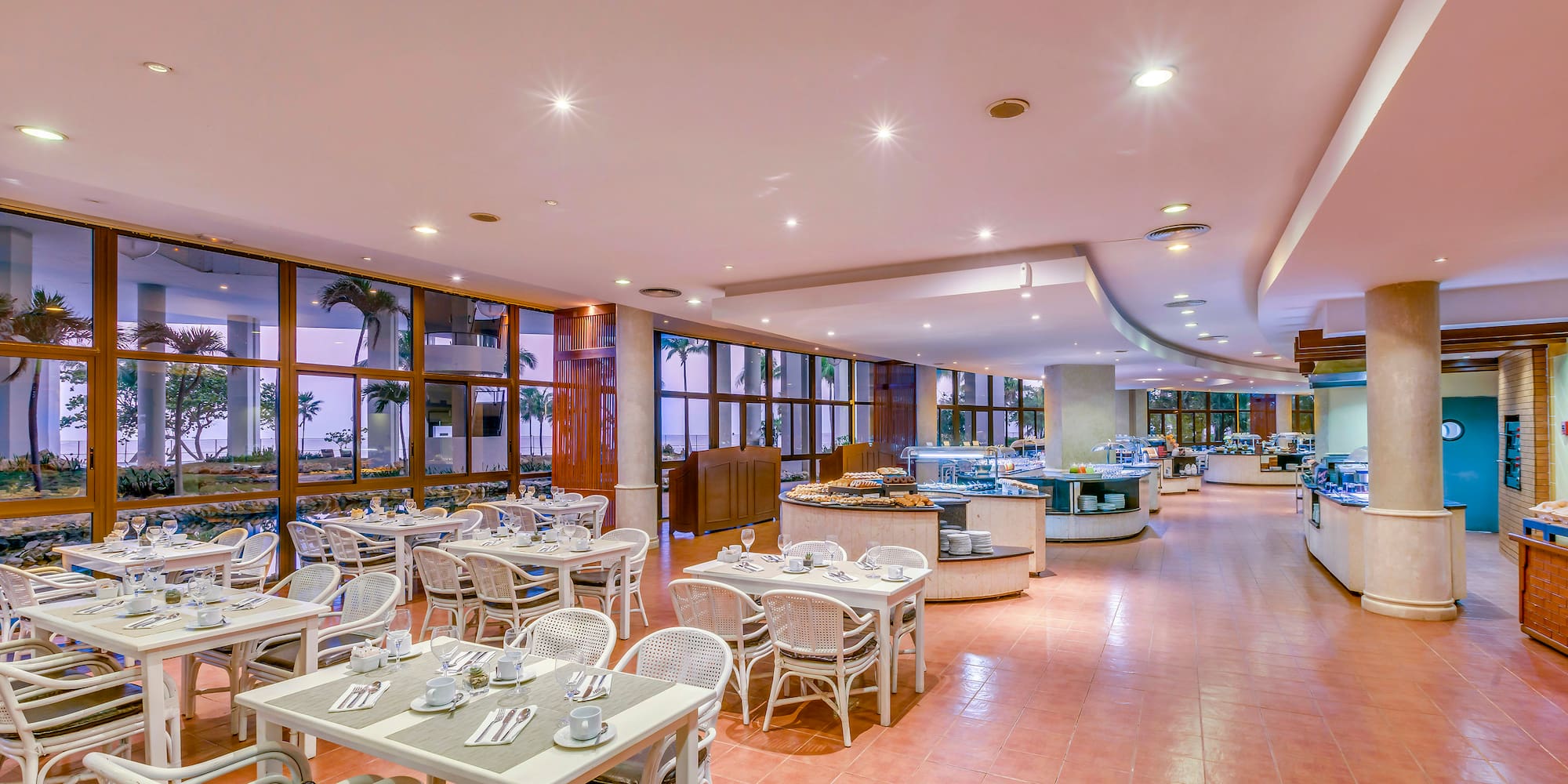 a restaurant with tables and chairs