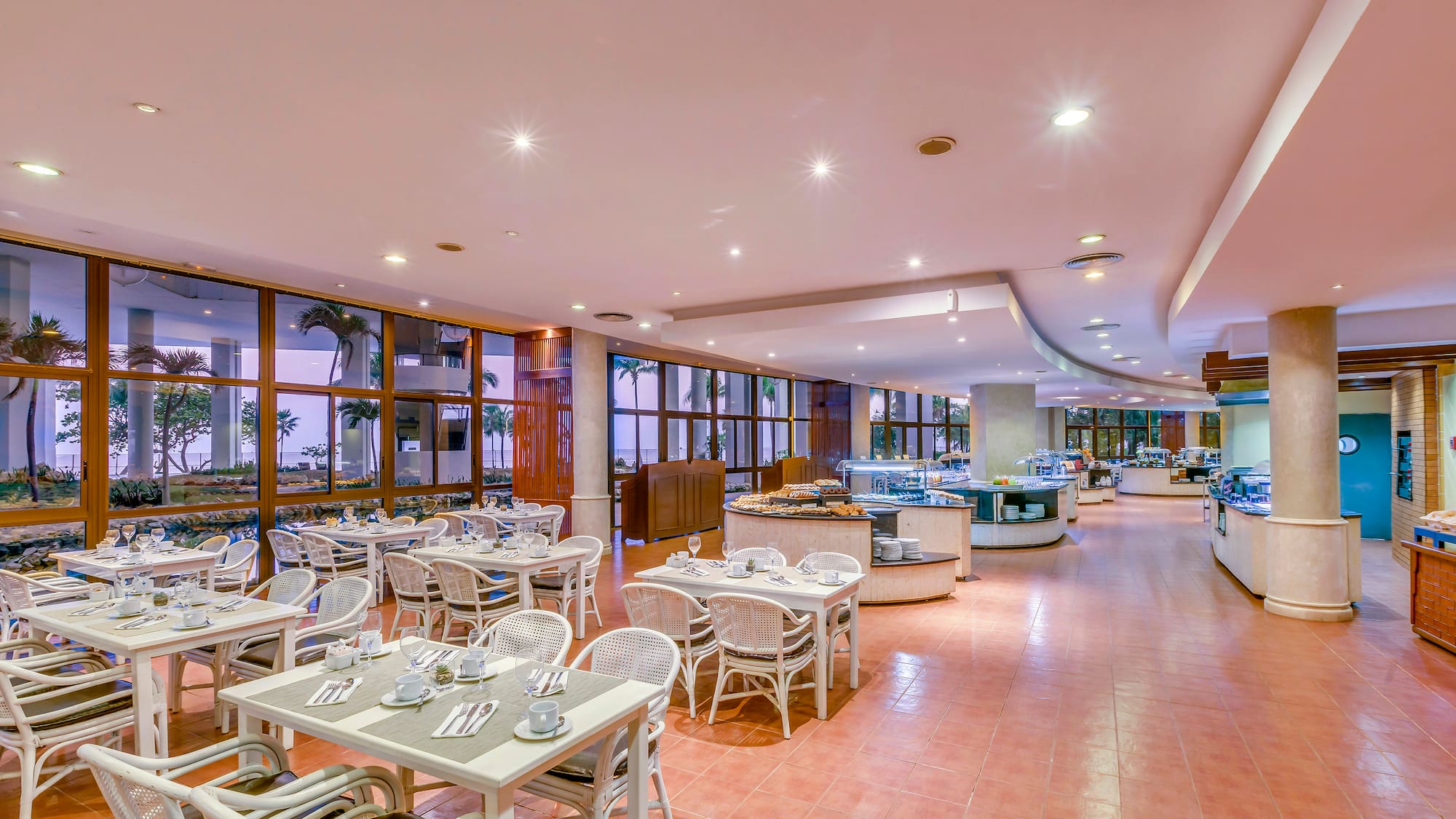 a restaurant with tables and chairs