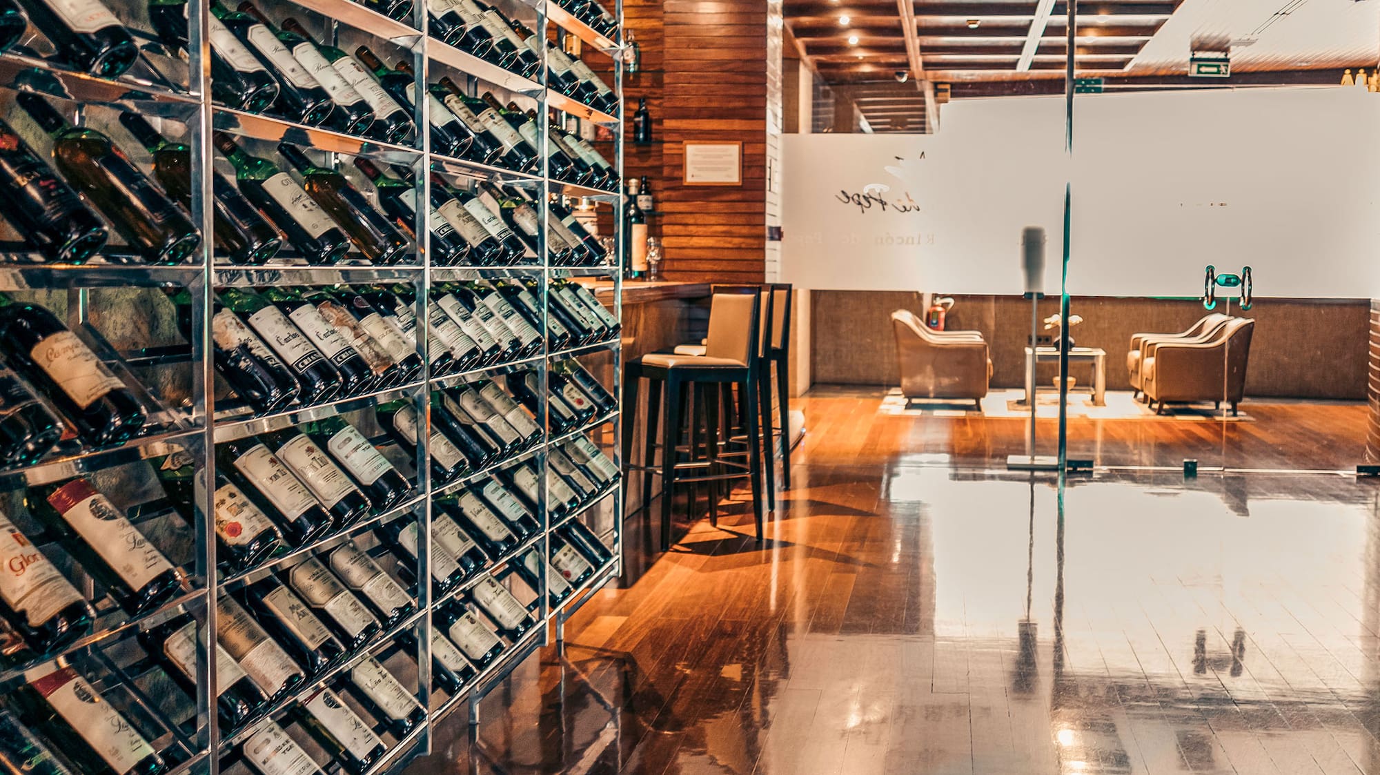 a wine rack with bottles on it