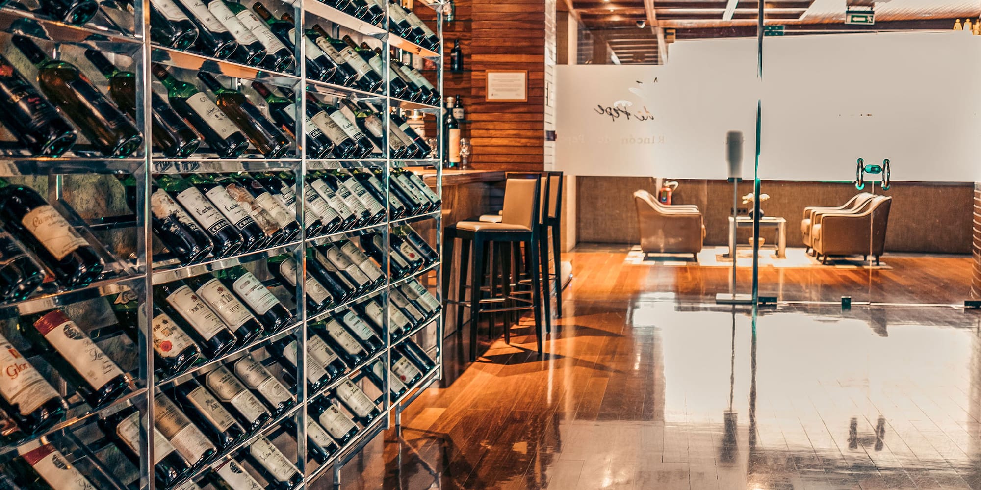 a wine rack with bottles on it