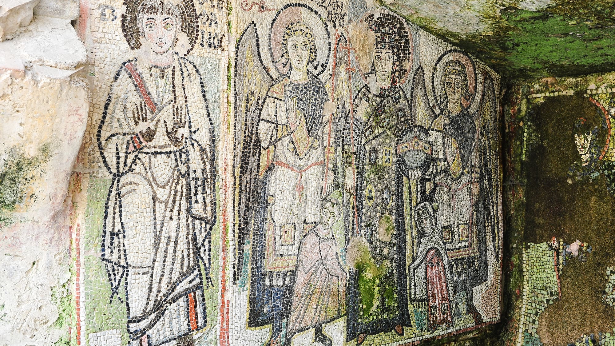 a mosaic of people in a cave