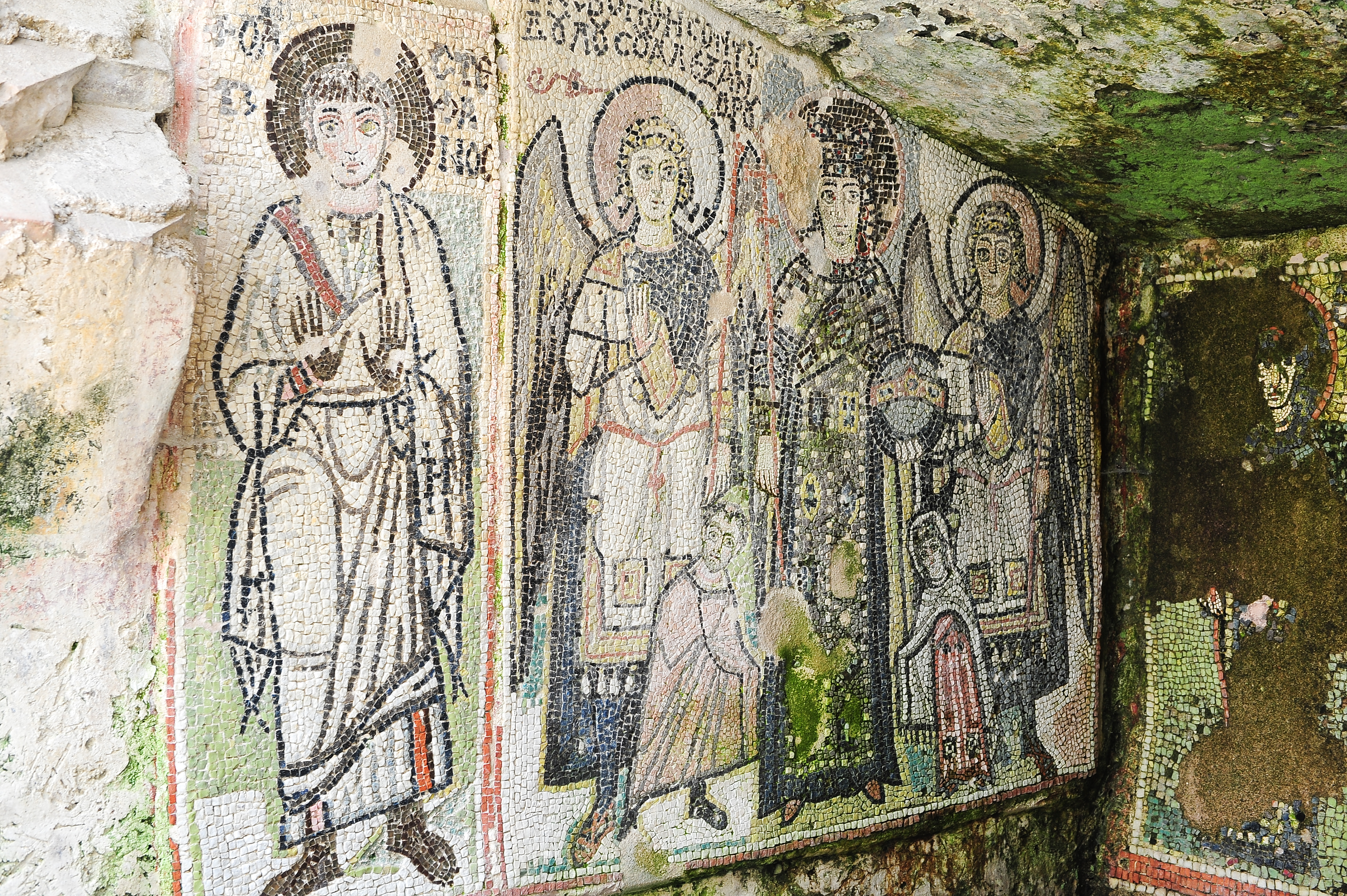 a mosaic of people in a cave