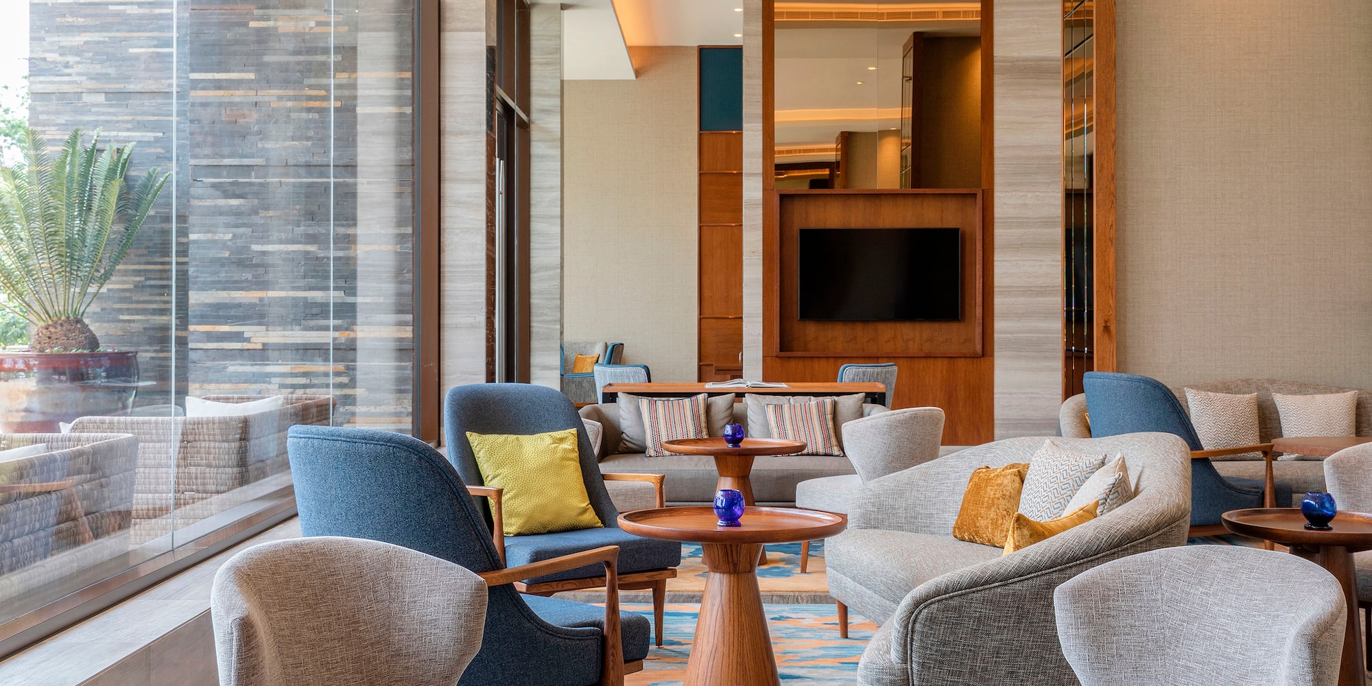 a room with a large window and a large wall